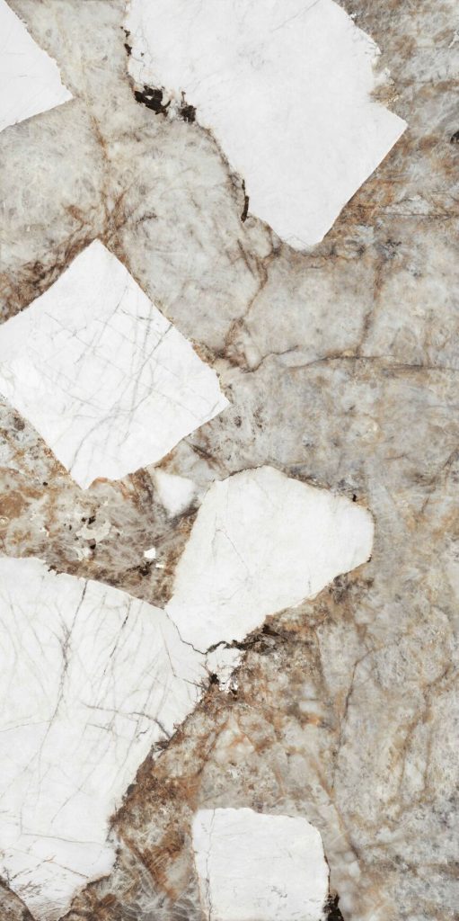 Beyaz kristal parçaları ve altın-kahve damarları olan Ascale Patagonia Gold porselen tezgah yüzeyinin yakın plan dokusu.