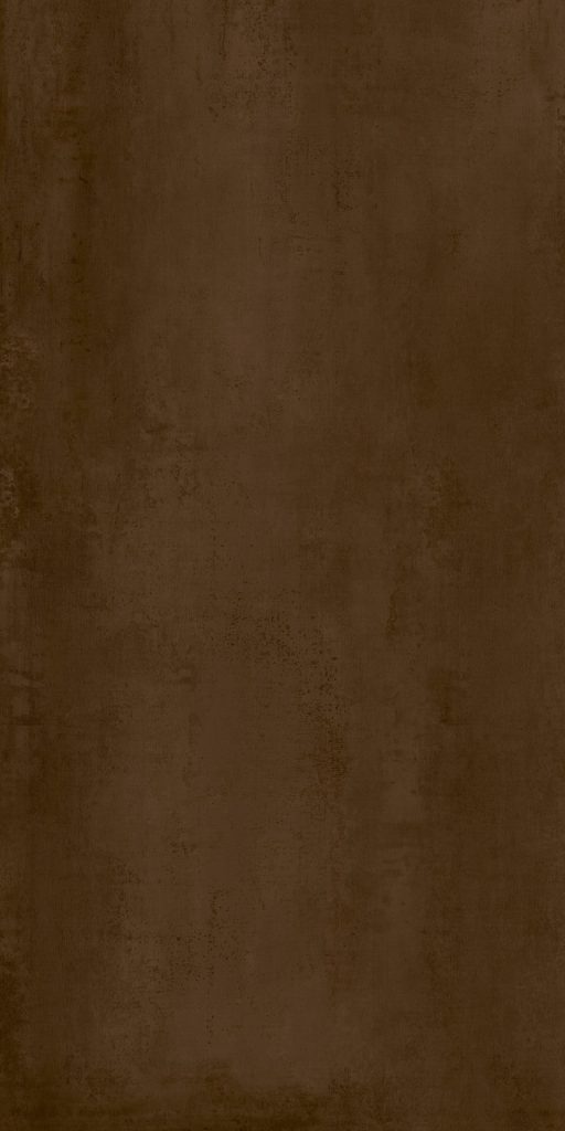 Paslanmış metal görünümlü, sıcak kahverengi tonlarda Marazzi Corten porselen tezgah plakasının doku detayı.