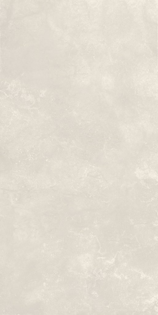 Fildişi rengi, doğal taş dokulu Lapidura Arenaria Stone Ivory porselen tezgah plakasının yüzey detayı.