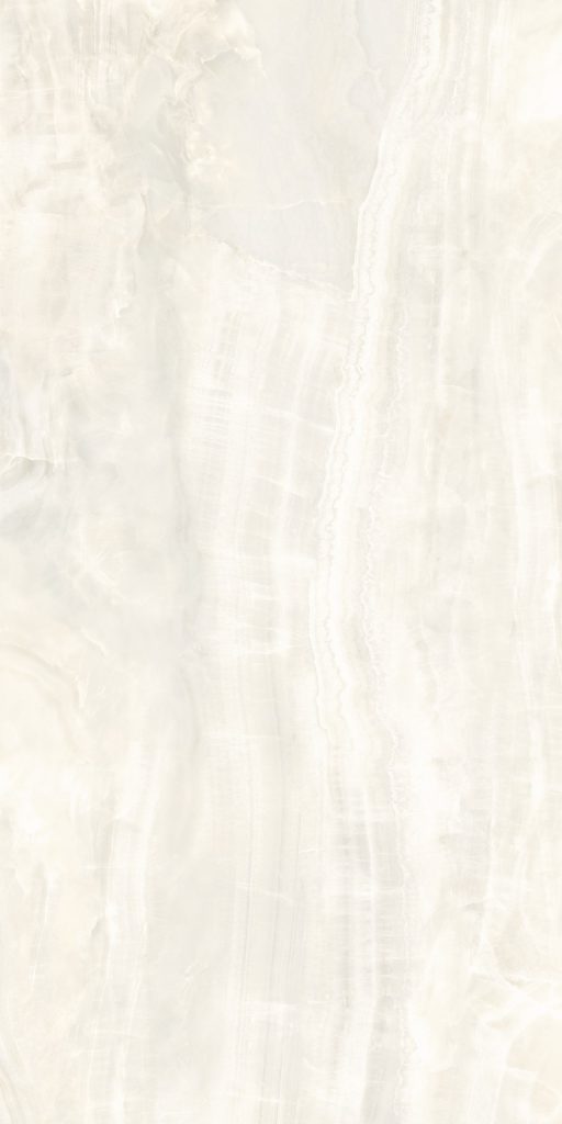 Fildişi ve krem tonlarında, katmanlı ve yarı saydam oniks taşı desenli Lapidura Ivory Onyx porselen plaka yüzeyi.