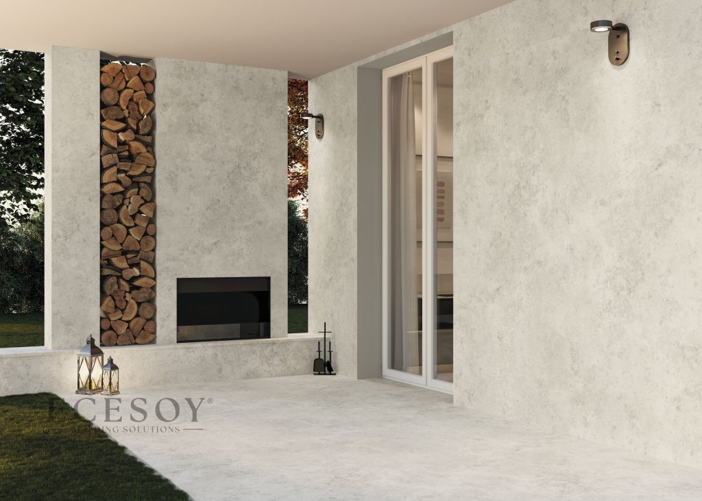 Lapidura Jura Beige porselen plaka ile kaplanmış şömineli modern teras zemin ve duvar uygulaması.