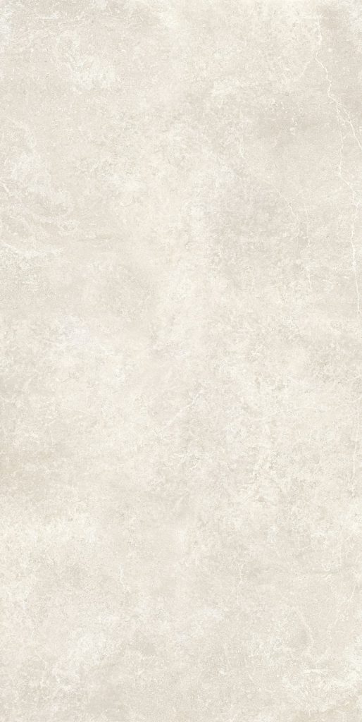 Doğal kireçtaşı dokulu, fildişi ve bej tonlarında, mat yüzeyli Lapidura Limestone Ivory porselen plaka yakın çekim.