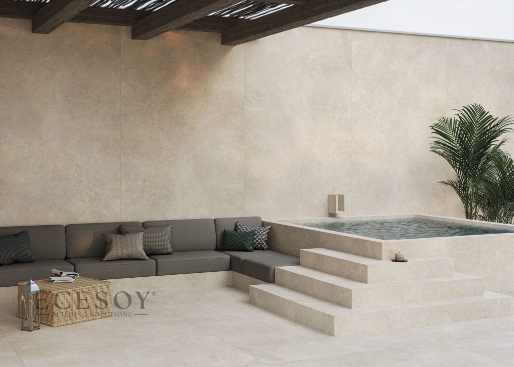 Bej renkli Lapidura Limestone Ivory porselen ile kaplanmış havuzlu teras, duvar ve zemin uygulaması.