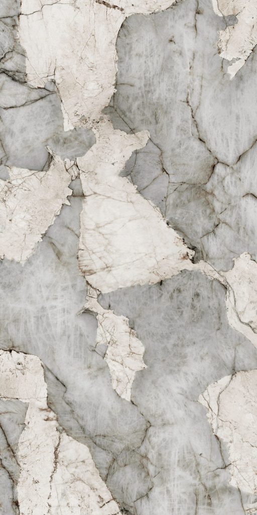 Lapidura Precious Stone porselen tezgahın gri, bej ve beyaz tonlardaki parçalı ve damarlı doğal taş dokusu.